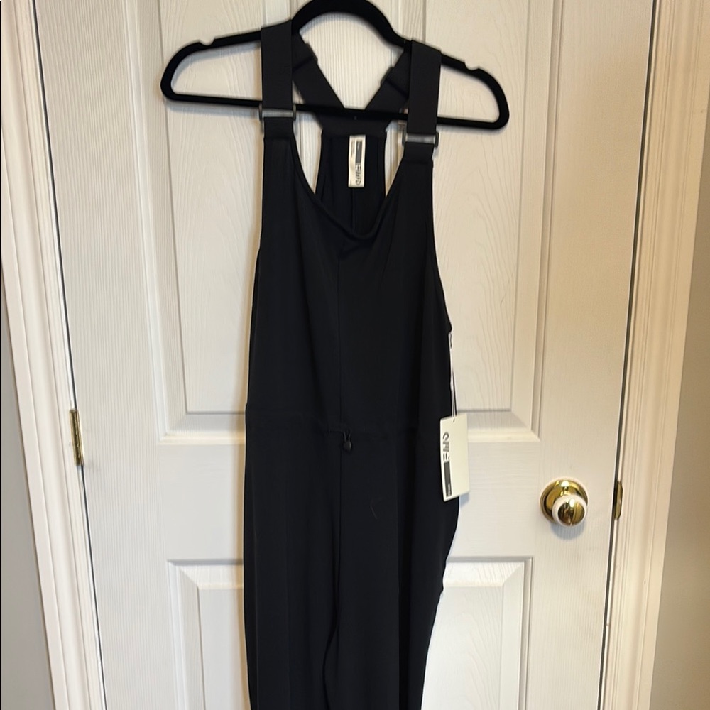 Sleek Black jersey Racerback Jumpsuit with Strappy Detail